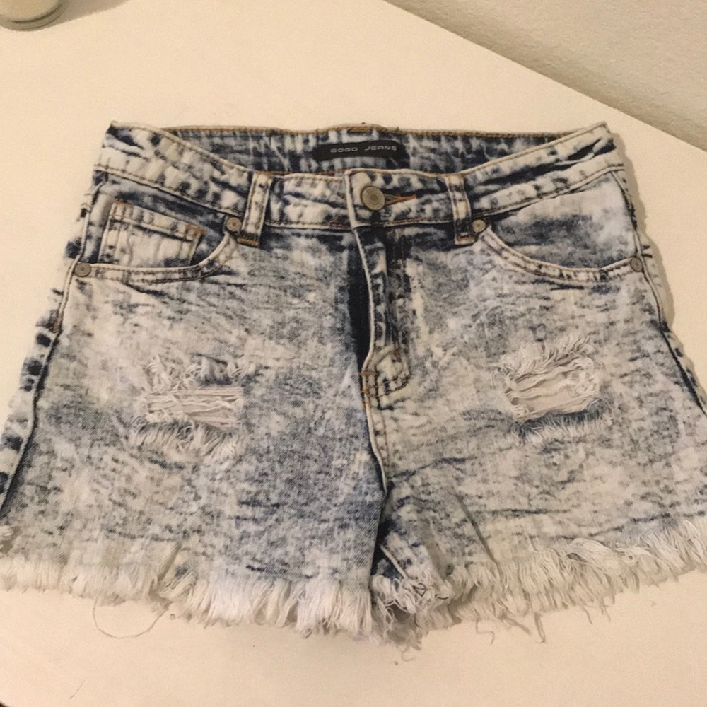 Acid wash distressed denim shorts
